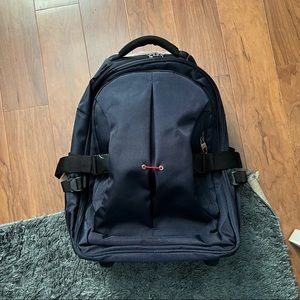 Travel Backpack 2 in 1 with Wheels and Handle and straps.